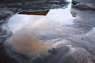 Oil in street Oil in street